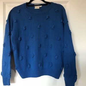 Fuzzy ball appliqué sweater